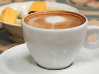 white-ceramic-cup-with-brown-liquid-inside.jpg white ceramic cup with brown liquid inside